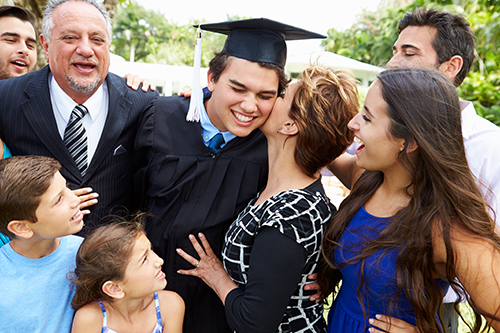 Hispanic College Graduate Student with Family