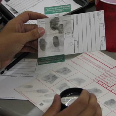 Student Examining Fingerprints